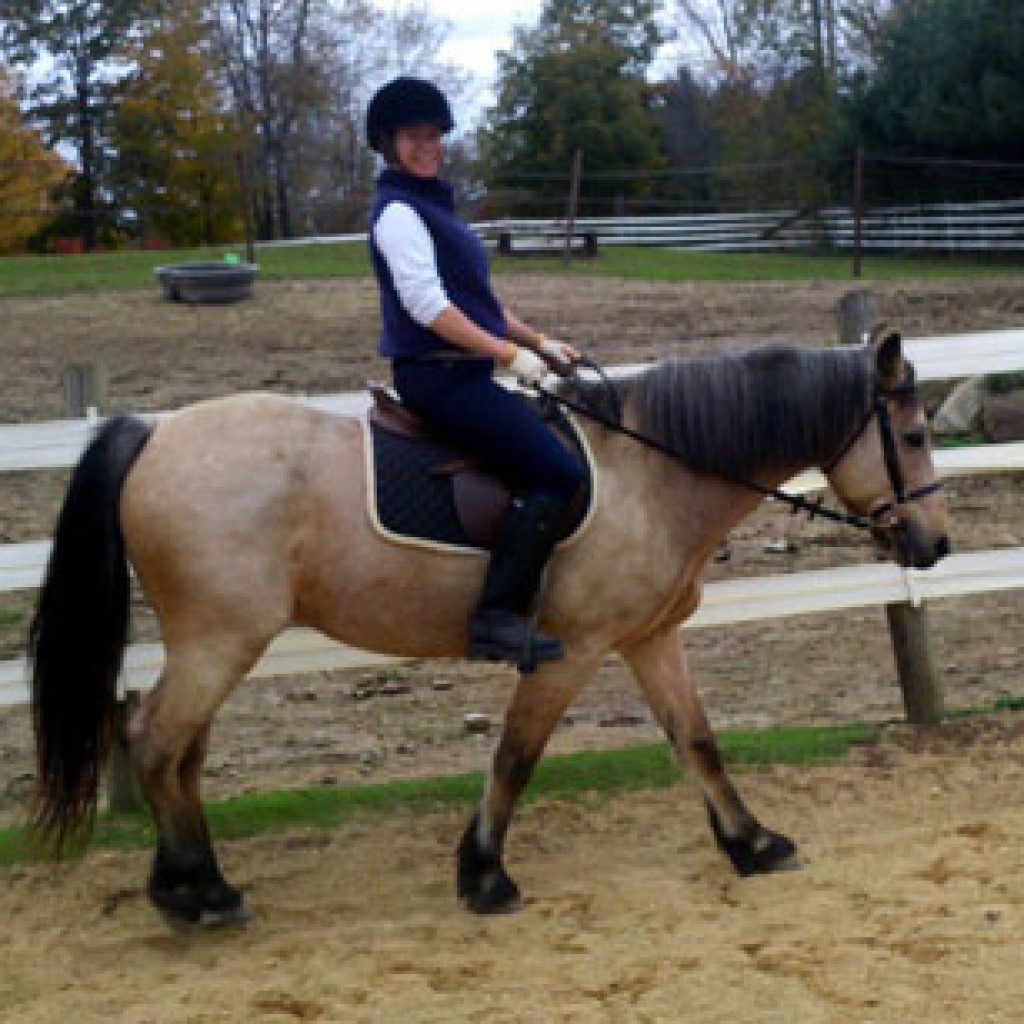 Mandy riding Starbuck