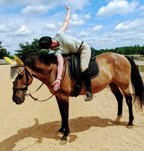 Horseback yoga lesson: triangle inversion