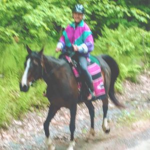 Jackie & student on dirt road to rail trail network.