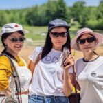 3 women at family farm horse event